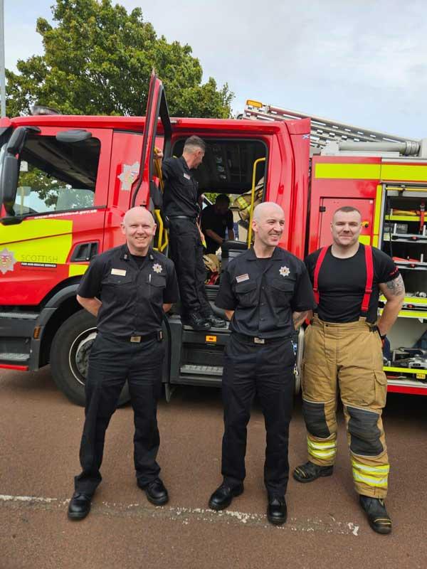 Firetruck And Firemen At Fun Day